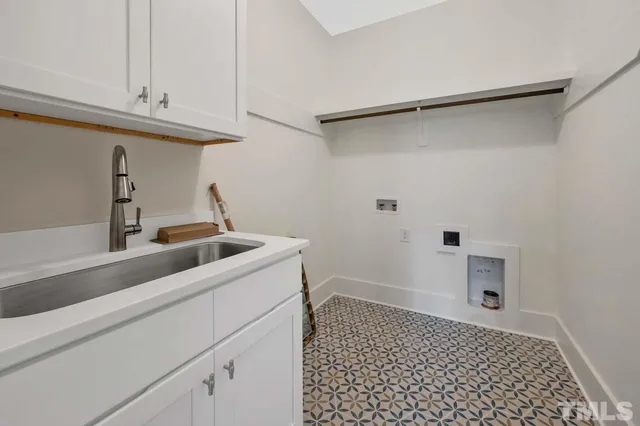 a bathroom with a sink and a shower