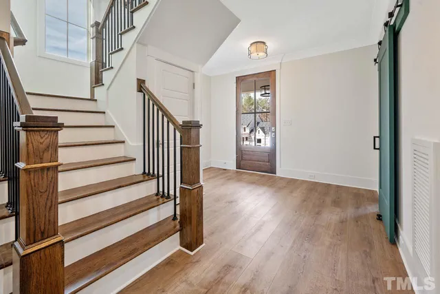 a view of entryway with wooden floor