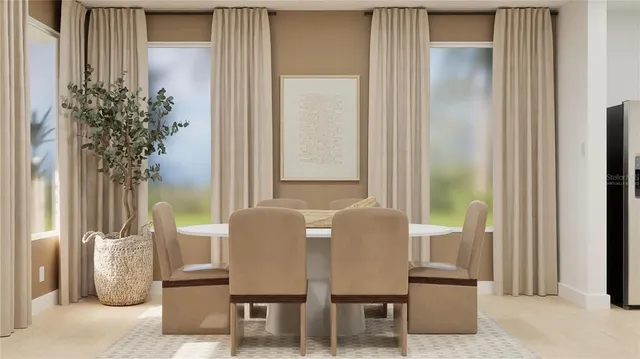 a dining room with furniture and window