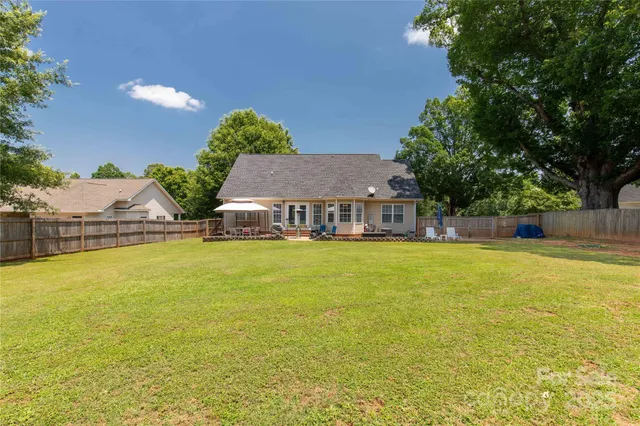a view of a swimming pool and an outdoor space