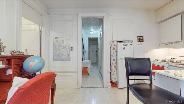 a bedroom with bed and a window