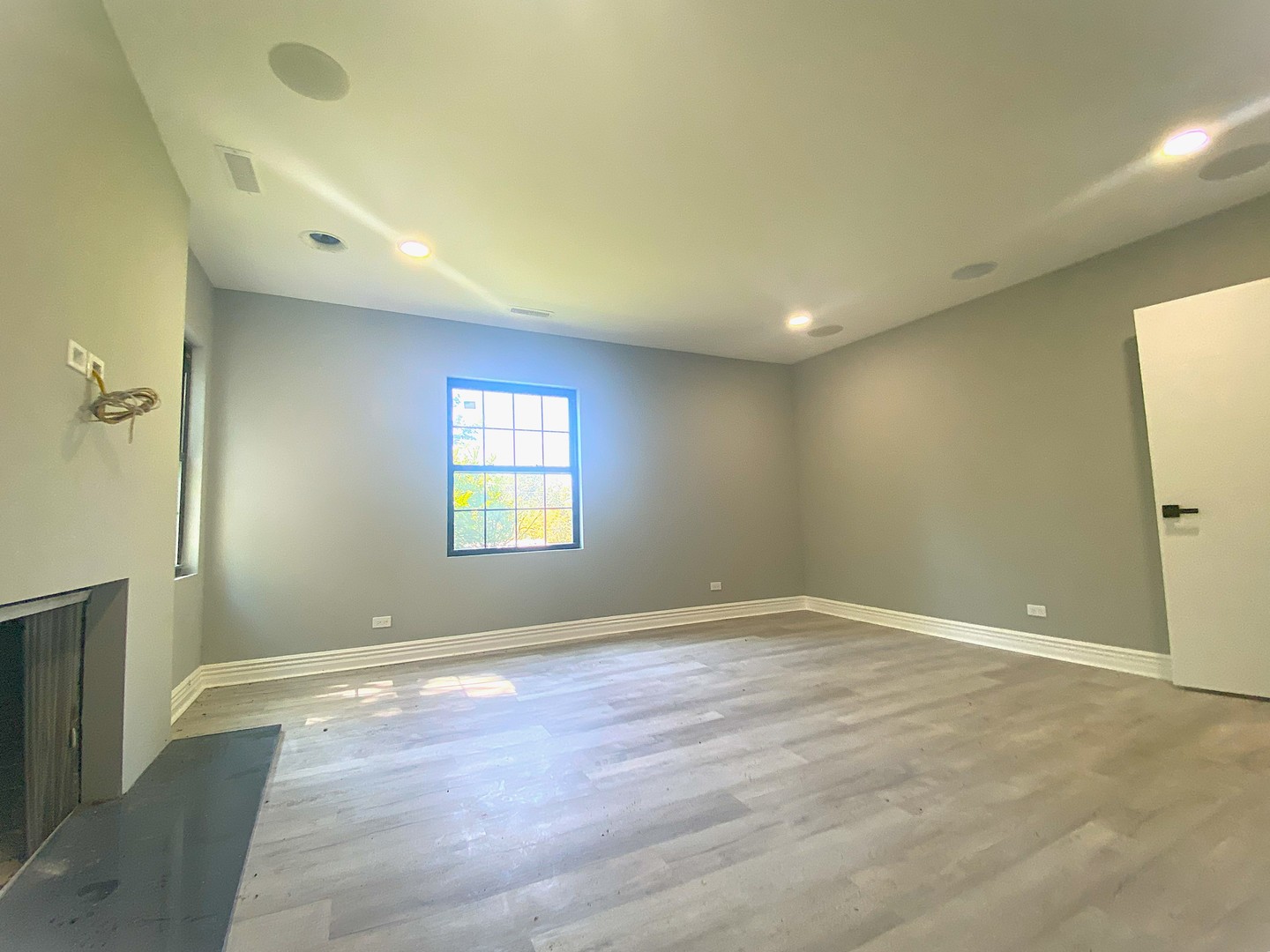 860 Green Bay Road Highland Park, IL 60035 - Photo 11 of 30 an empty room with wooden floor and windows