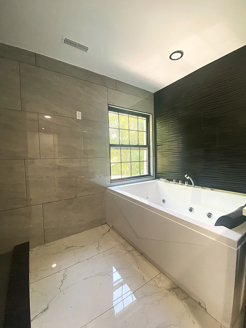 860 Green Bay Road Highland Park, IL 60035 - Photo 14 of 30 a bathroom with a bathtub and shower