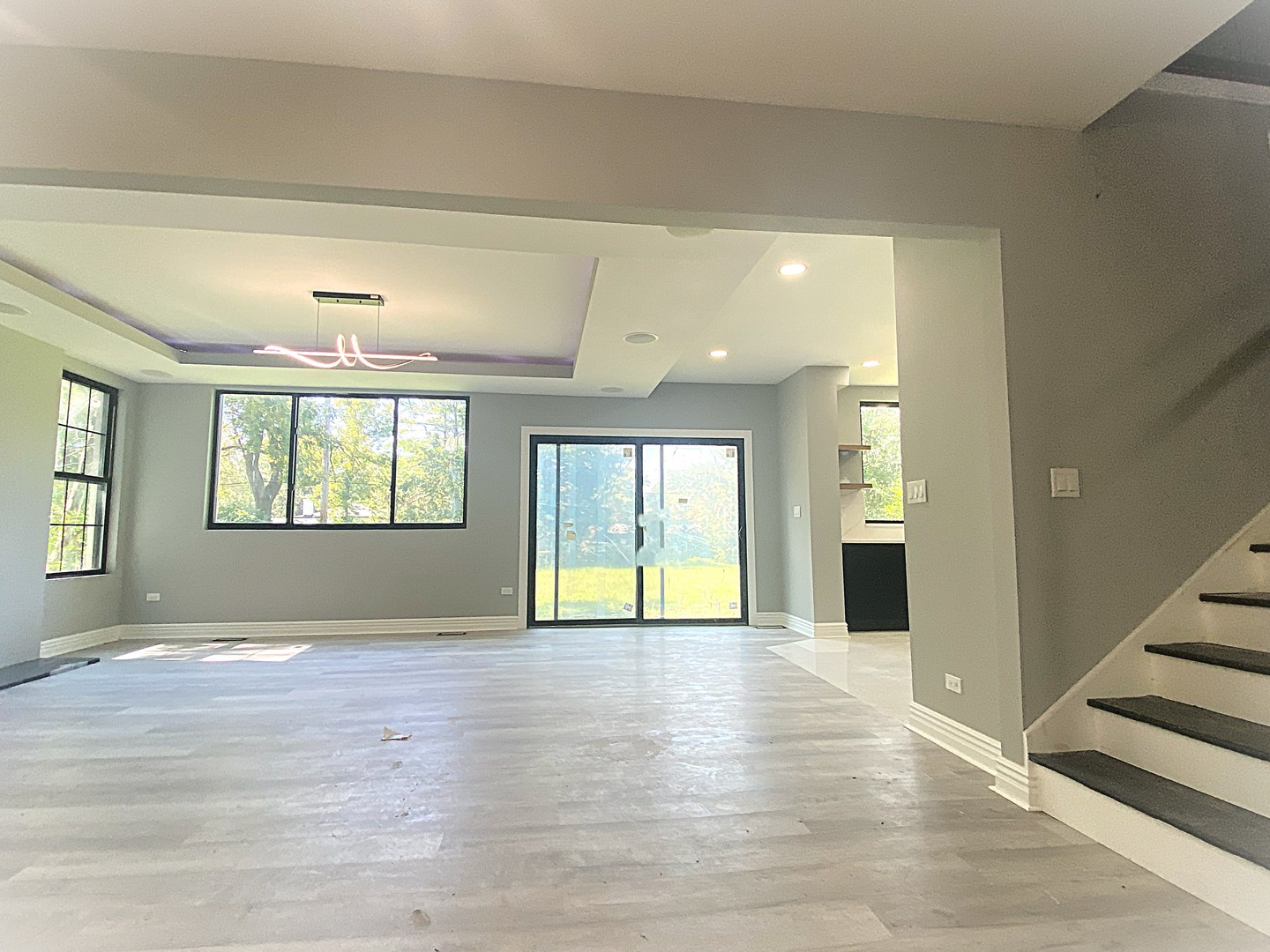 860 Green Bay Road Highland Park, IL 60035 - Photo 4 of 30 a view of an empty room with wooden floor and a window