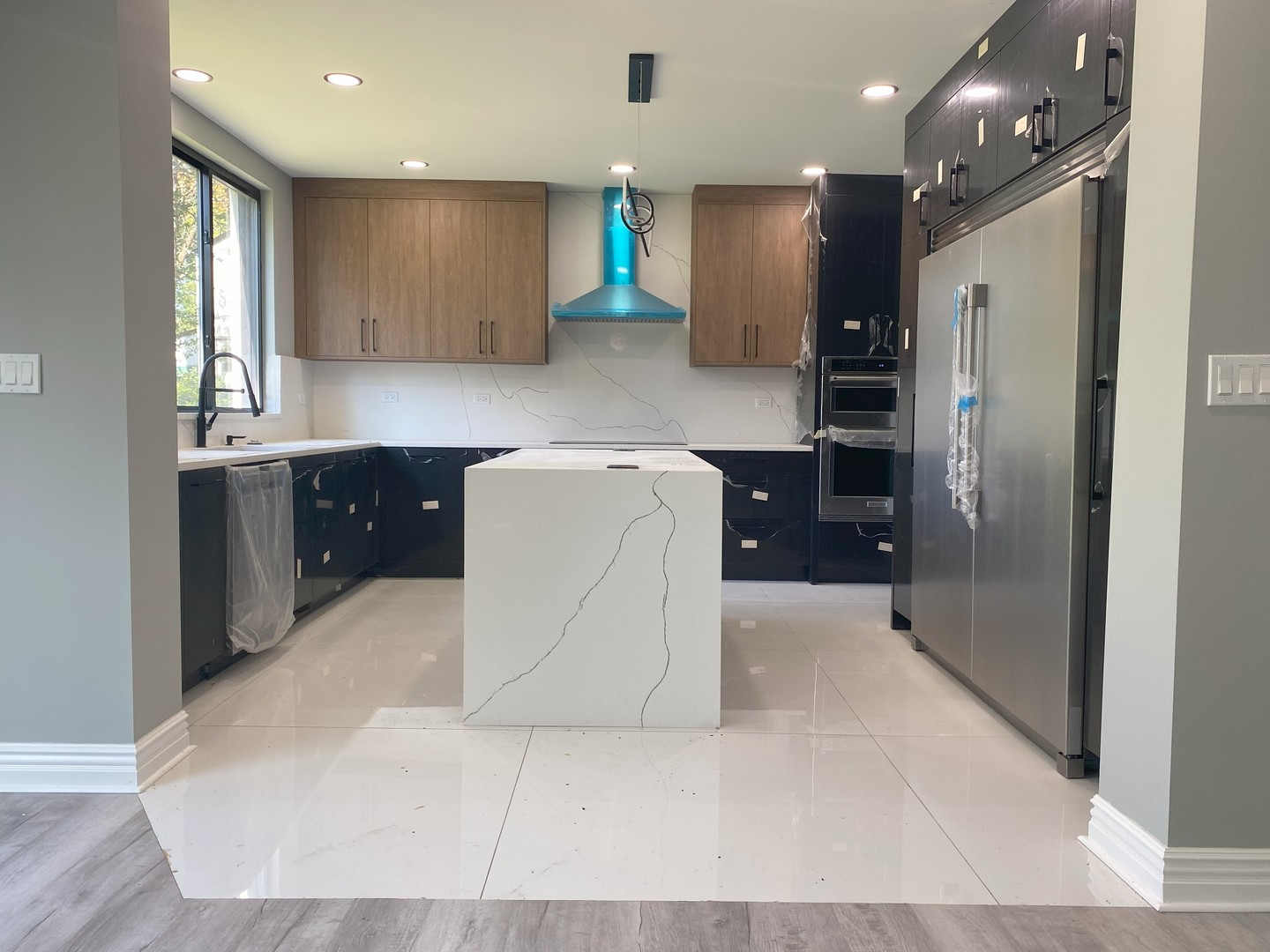 860 Green Bay Road Highland Park, IL 60035 - Photo 5 of 30 a kitchen with kitchen island cabinets and refrigerator