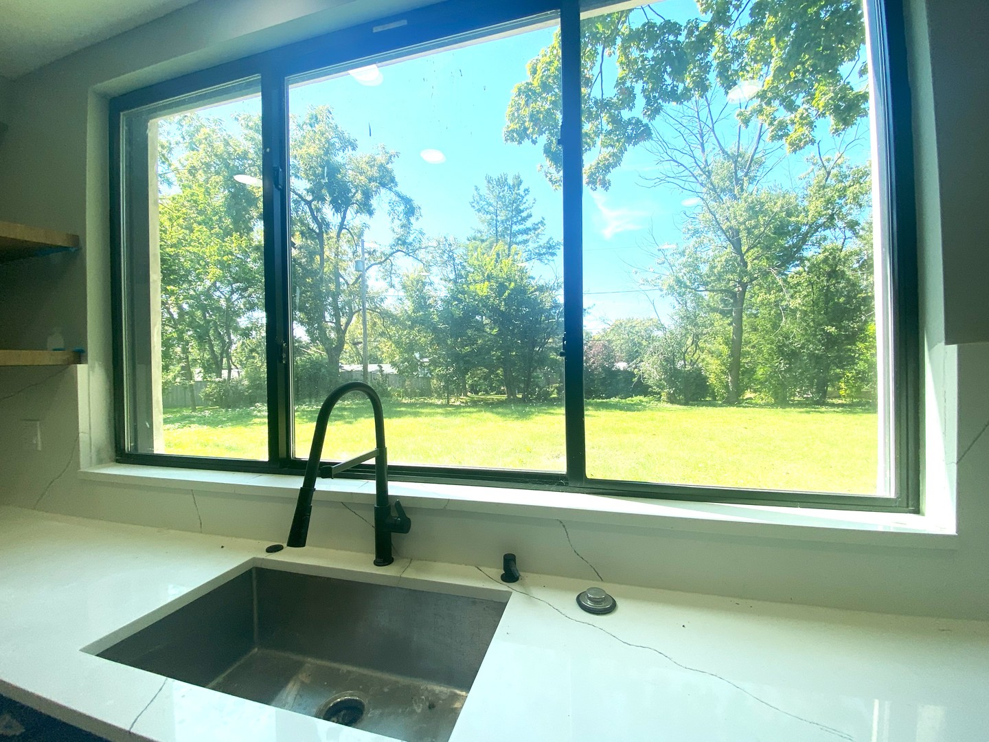 860 Green Bay Road Highland Park, IL 60035 - Photo 7 of 30 a bathroom with a sink and a large window