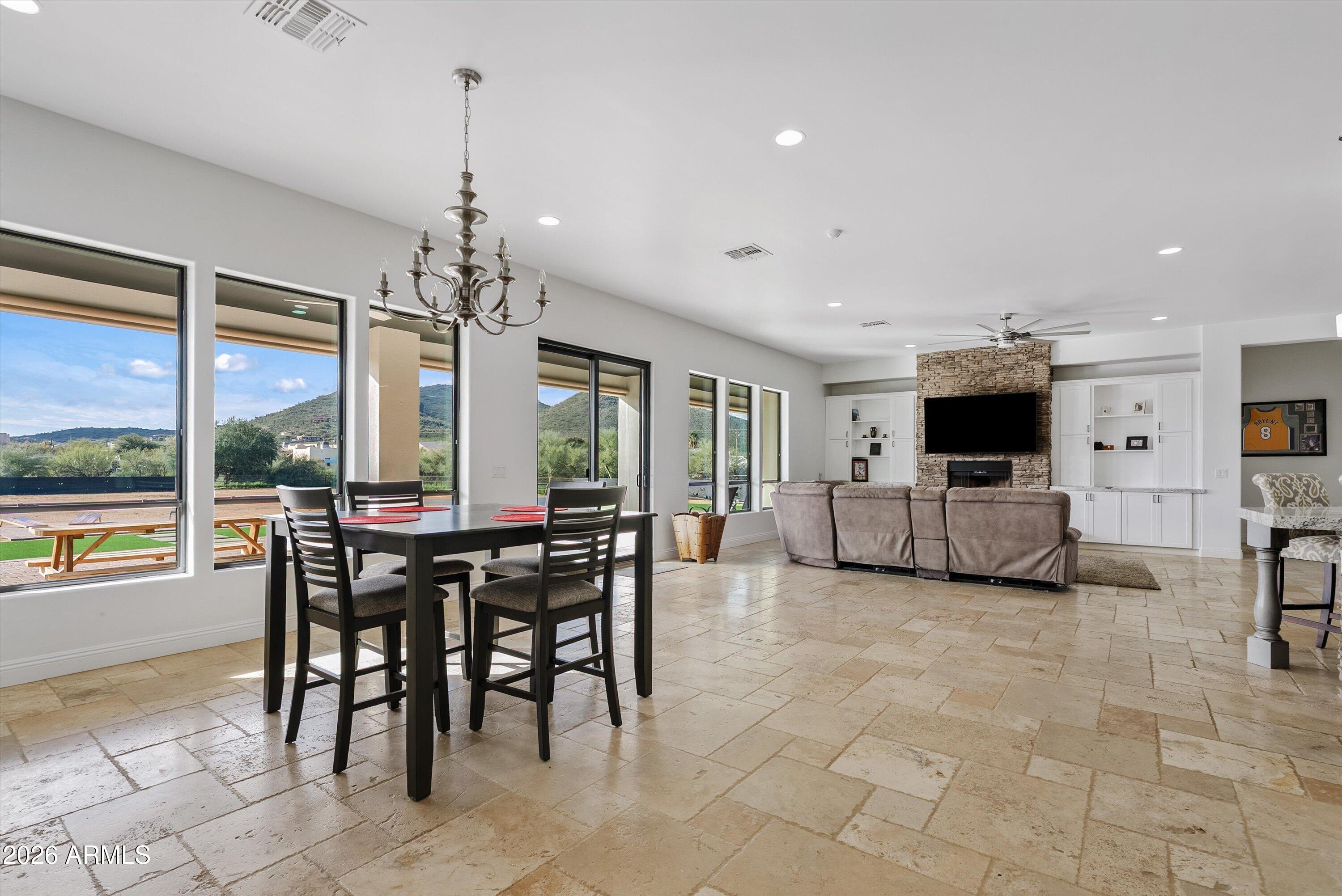 1617 West Maddock Road Phoenix, AZ 85086 - Photo 18 of 50 a view of a dining room with furniture window and outside view