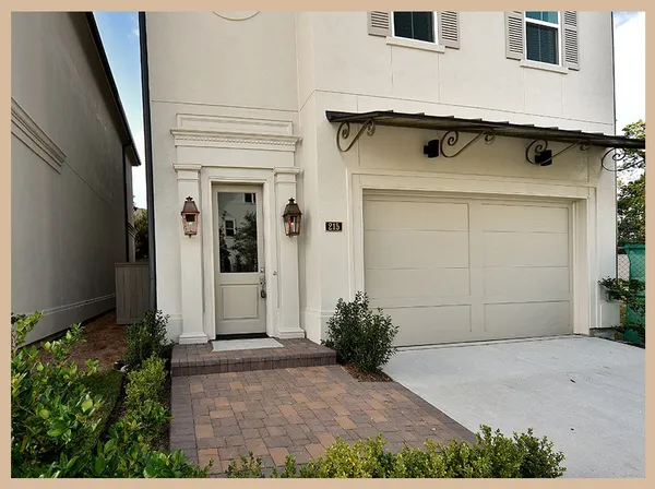 a view of front door and yard