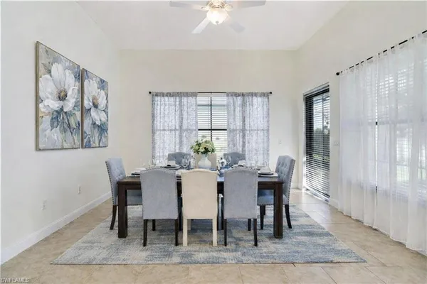 a view of a dining room with furniture