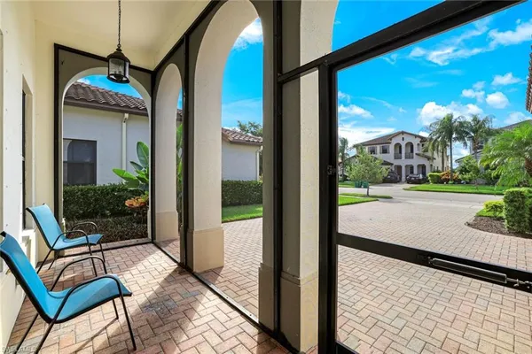 a view of swimming pool with a patio