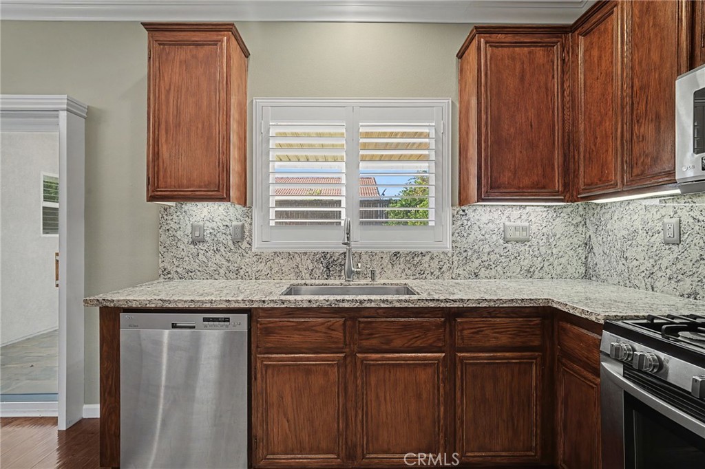 733 Daybreak Way Banning, CA 92220 - Photo 8 of 22 Shuttered windows and recessed lighting