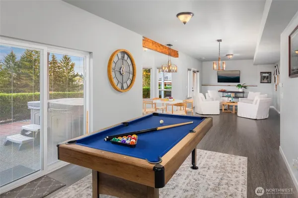 a living room with furniture and a table