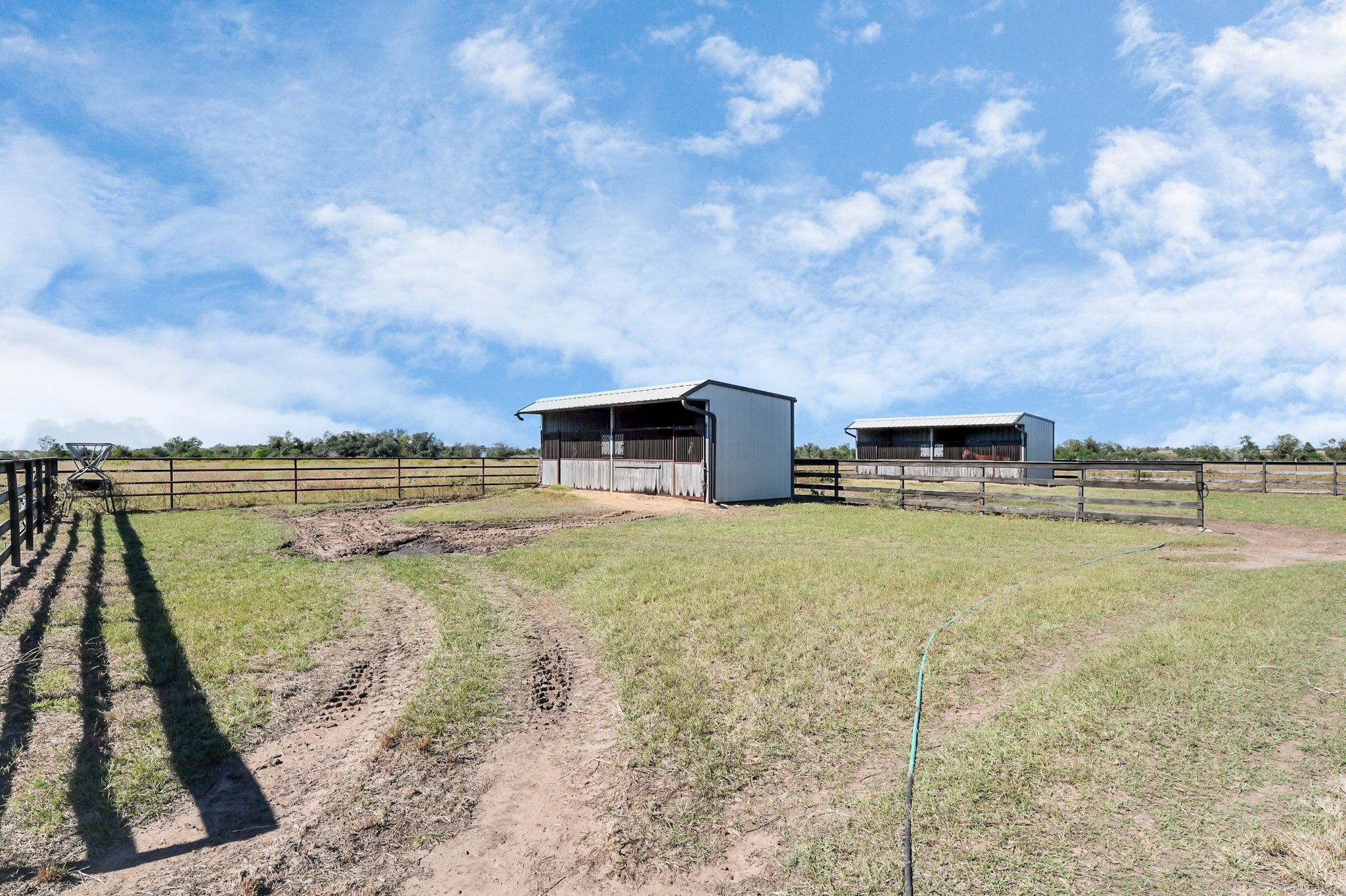 14793 Blinka Road Waller, TX 77484 - Photo 26 of 50 a view of a terrace with a garden