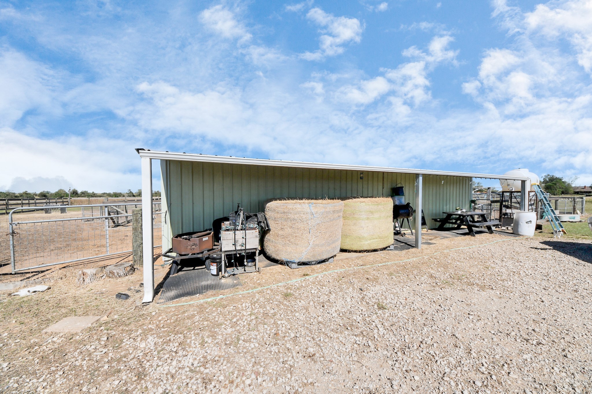 14793 Blinka Road Waller, TX 77484 - Photo 44 of 50 a view of a terrace with chairs