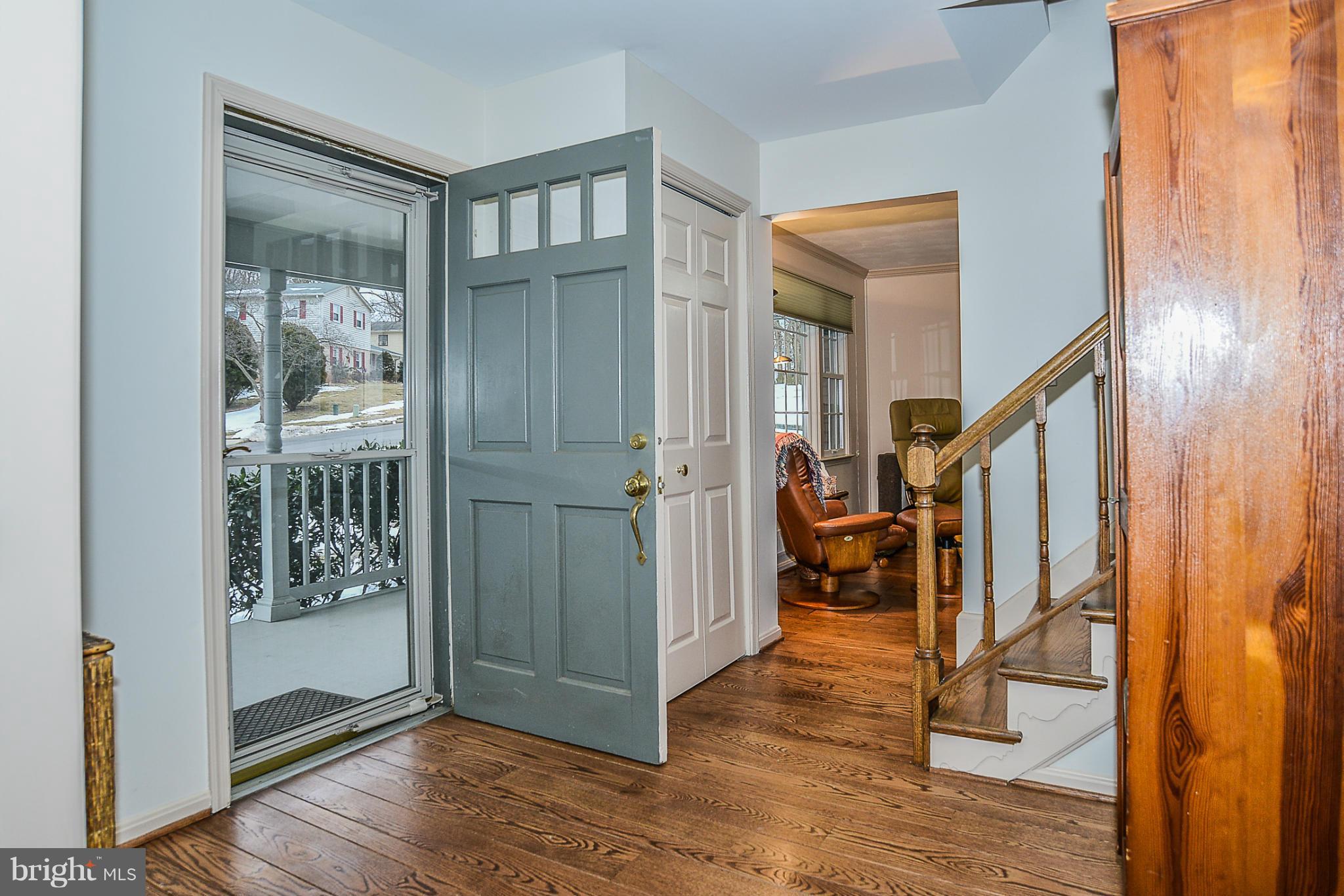 6943 Conservation Drive Springfield, VA 22153 - Photo 3 of 30 Entry foyer with hardwood floor