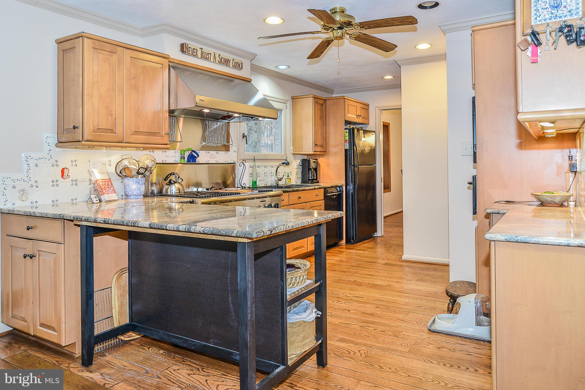 6943 Conservation Drive Springfield, VA 22153 - Photo 8 of 30 Updated Kitchen with granite counter tops