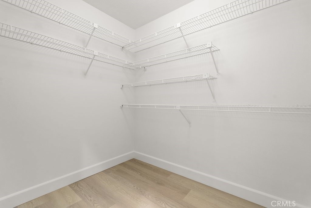 4 Las Cruces Irvine, CA 92614 - Photo 16 of 33 a view of a room with racks on the wall