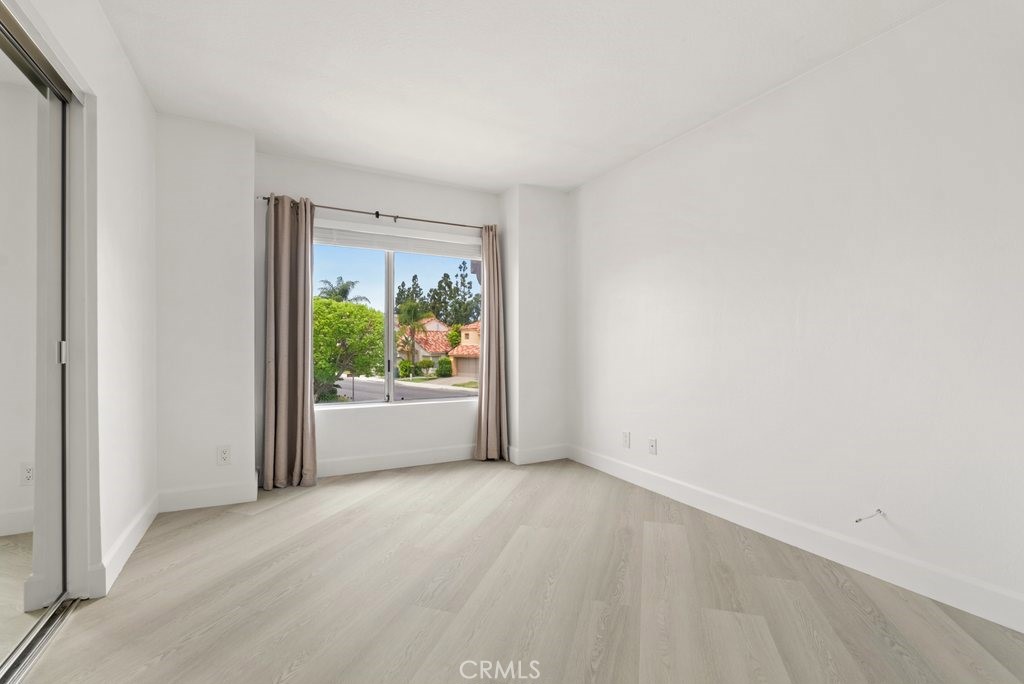 4 Las Cruces Irvine, CA 92614 - Photo 17 of 33 a view of an empty room with a window