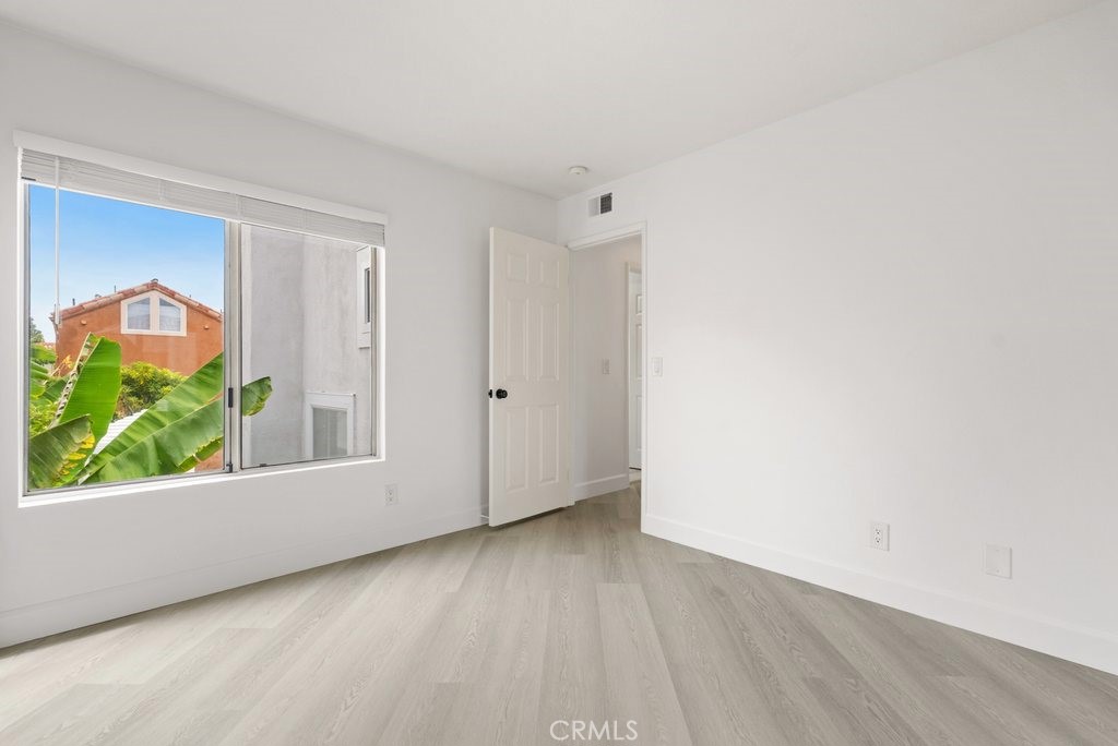 4 Las Cruces Irvine, CA 92614 - Photo 20 of 33 wooden floor in an empty room with a window