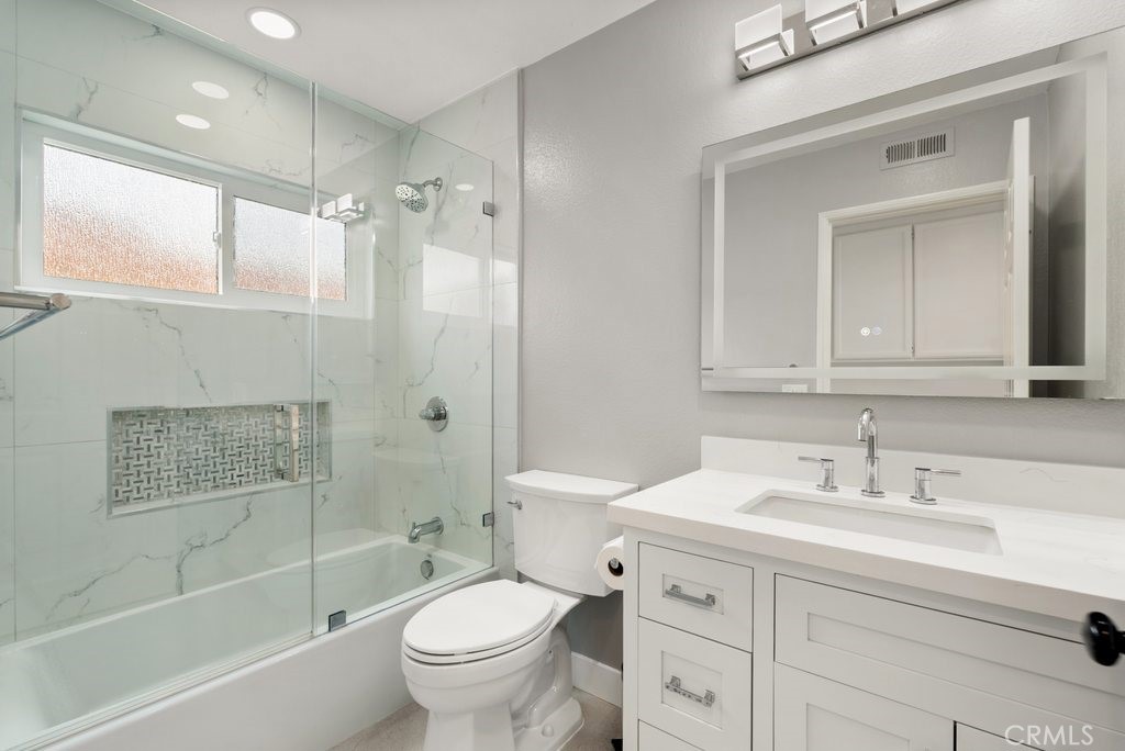 4 Las Cruces Irvine, CA 92614 - Photo 22 of 33 a bathroom with a sink toilet and shower