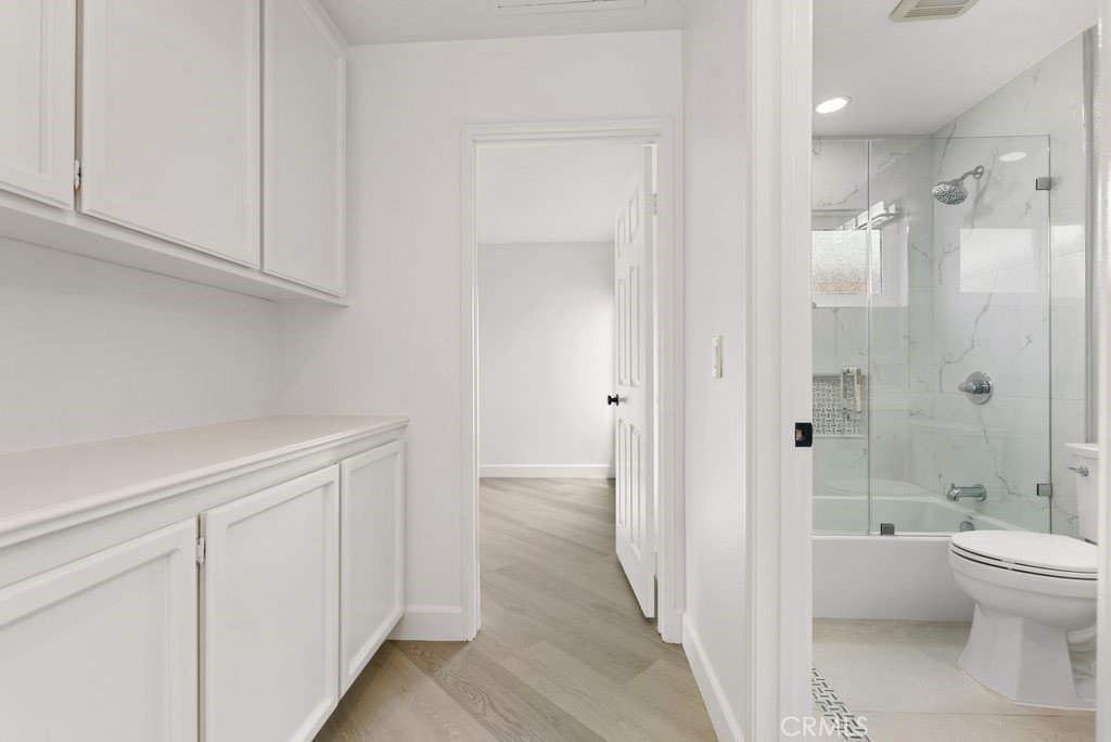 4 Las Cruces Irvine, CA 92614 - Photo 23 of 33 a bathroom with a sink a toilet and shower