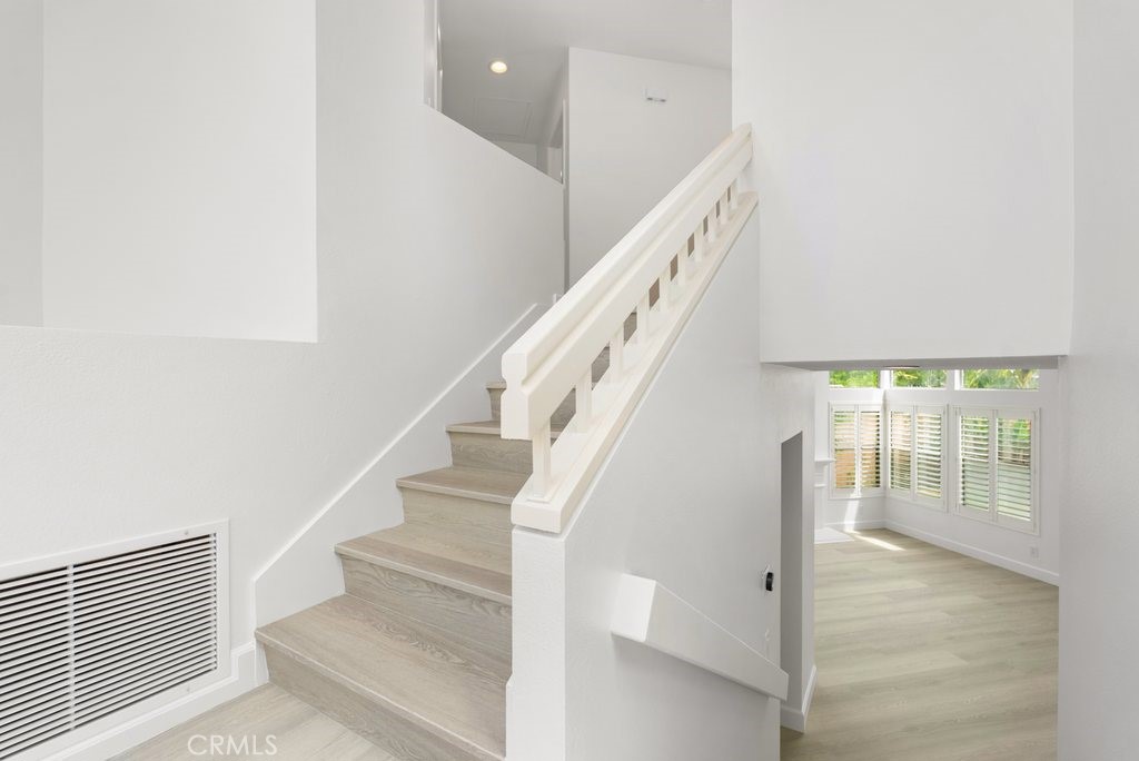 4 Las Cruces Irvine, CA 92614 - Photo 25 of 33 a view of entryway and hall with wooden floor