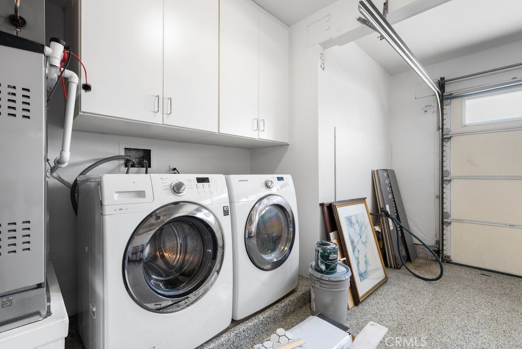 4 Las Cruces Irvine, CA 92614 - Photo 26 of 33 a utility room with dryer and washer