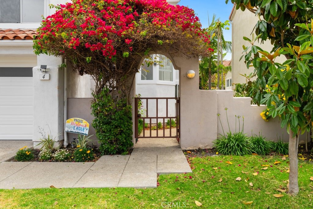 4 Las Cruces Irvine, CA 92614 - Photo 3 of 33 a front view of a house with garden