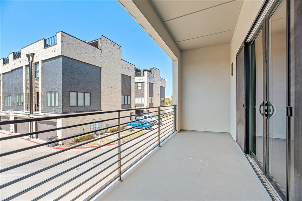 4060 Spring Valley Road, Unit 405 Farmers Branch, TX 75244 - Photo 2 of 10 Balcony in the Living Room