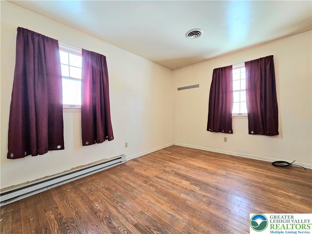 301 Frederick Street Easton, PA 18042 - Photo 13 of 19 a view of a room with window and hardwood floor