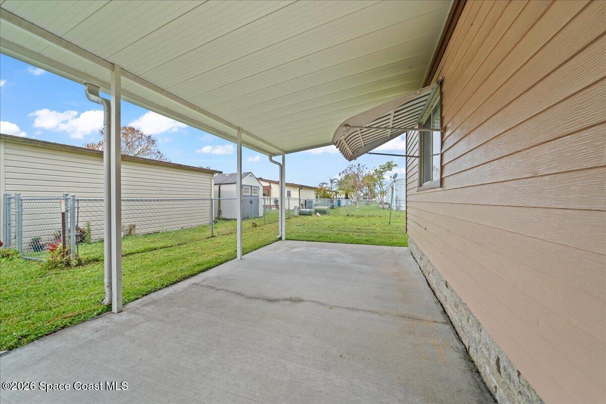 1740 Seagrape Street Northeast Palm Bay, FL 32905 - Photo 15 of 33 a view of outdoor space and yard