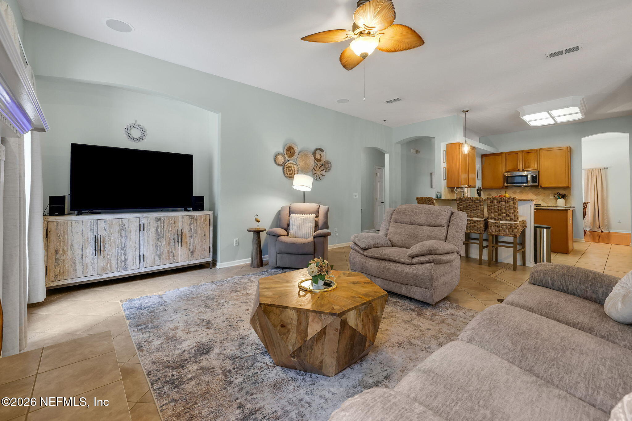4320 Rye Court St. Johns, FL 32259 - Photo 16 of 60 a living room with furniture and a flat screen tv