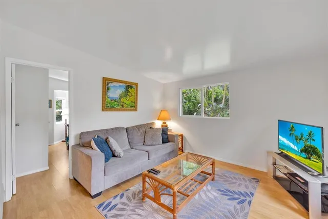 a living room with furniture and a couch