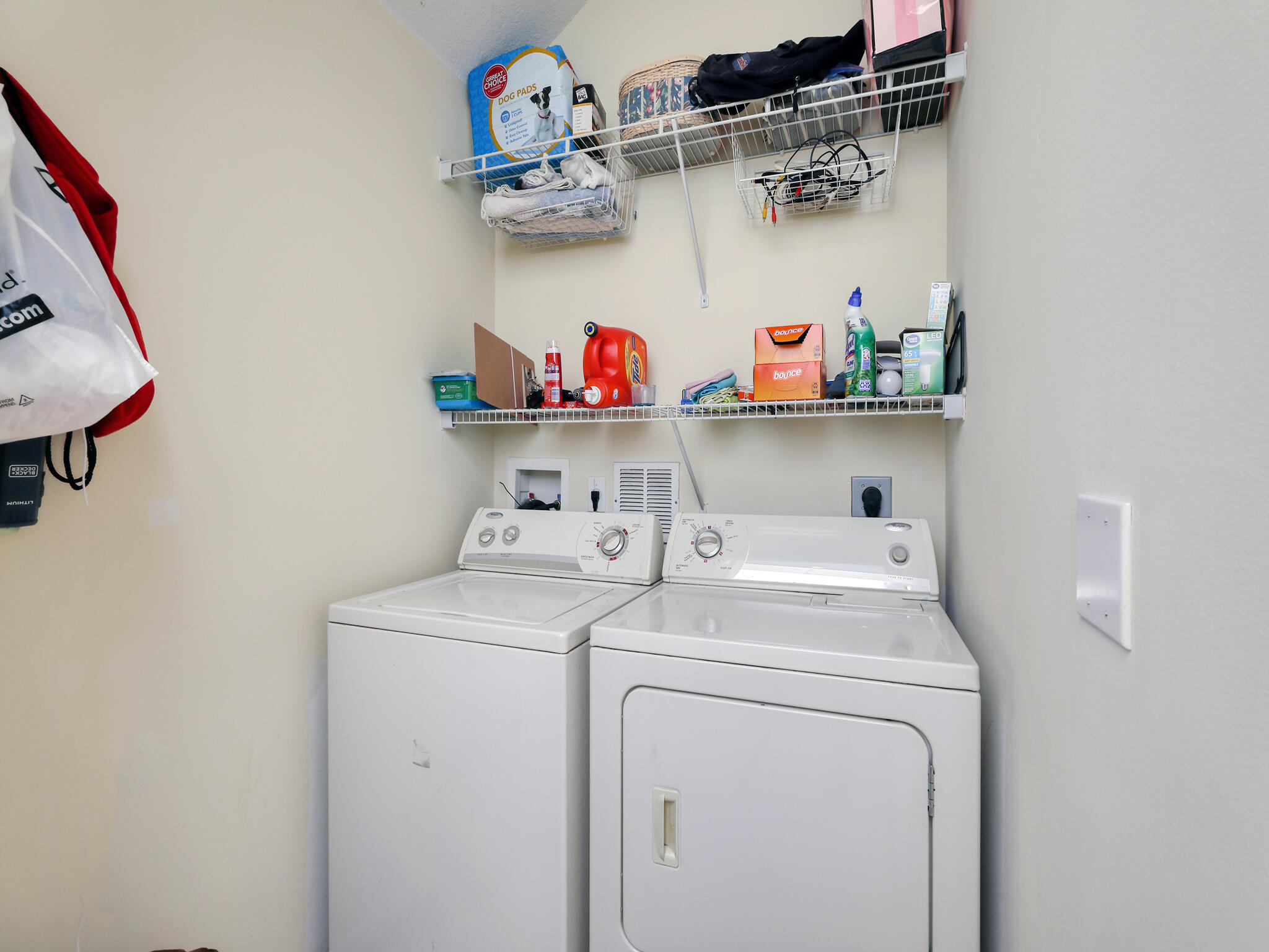 102 Astor Circle Delray Beach, FL 33484 - Photo 8 of 29 a utility room with dryer and washer