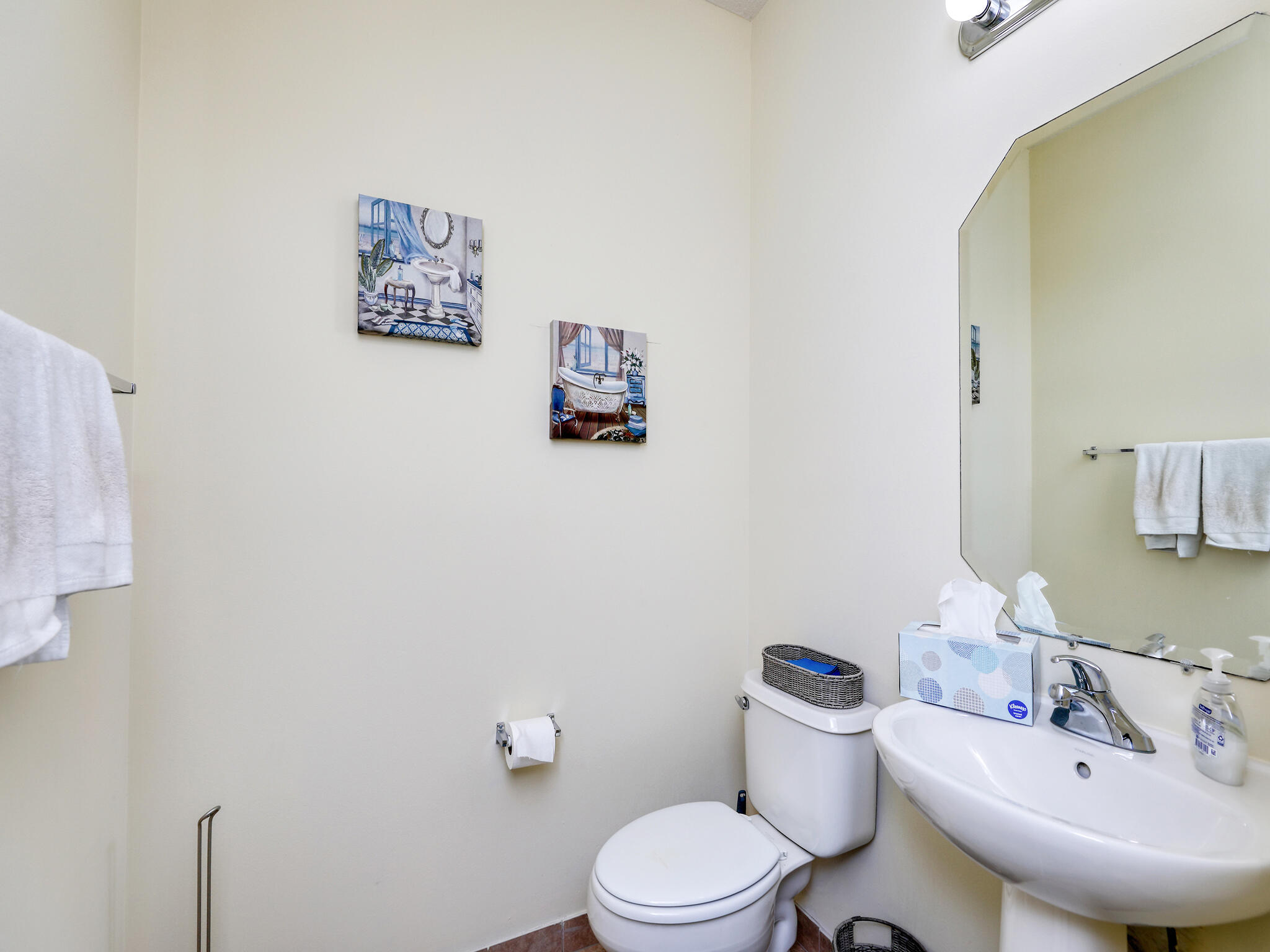 102 Astor Circle Delray Beach, FL 33484 - Photo 9 of 29 a bathroom with a sink mirror and toilet