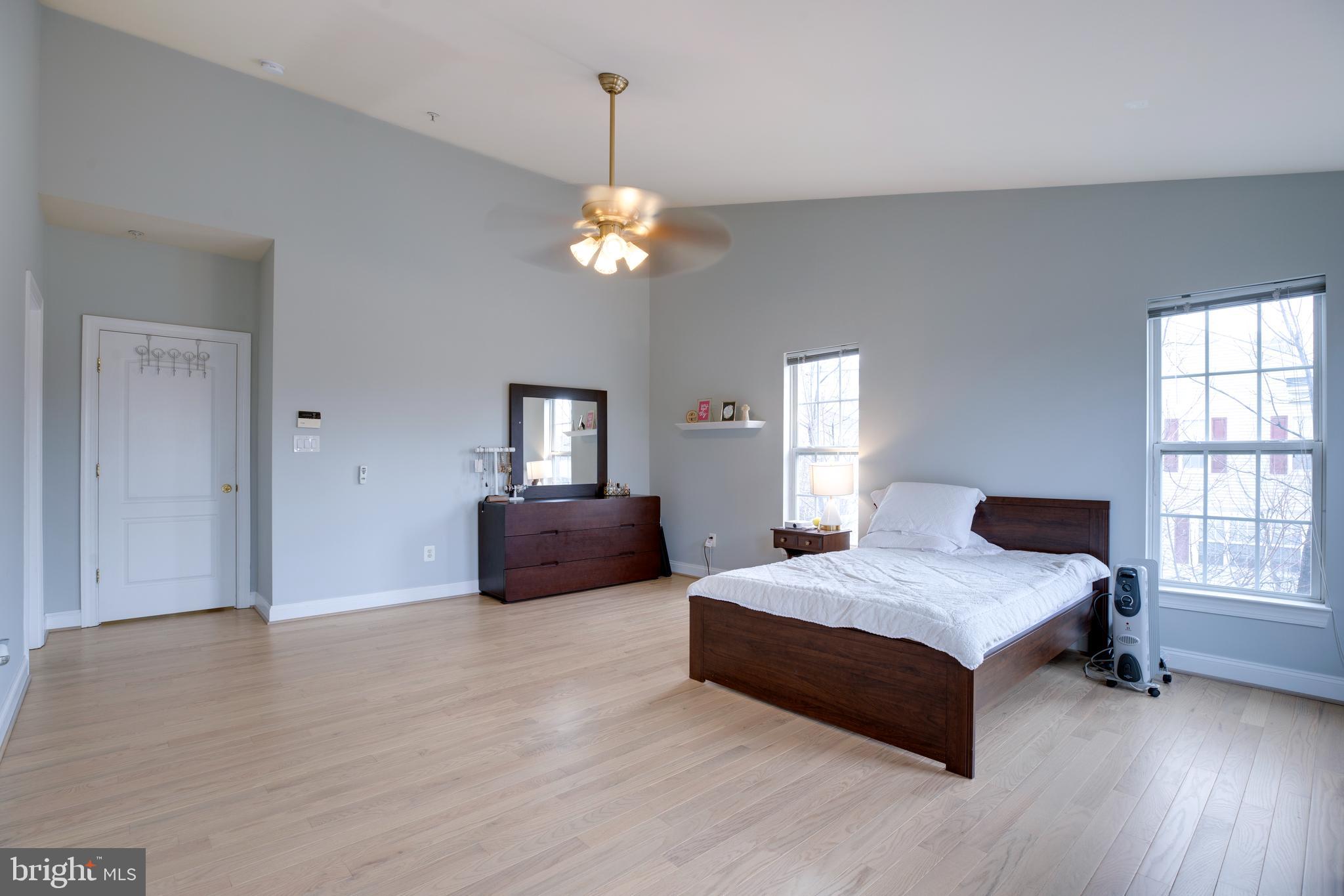 8069 Gatehouse Road, Unit 23 Falls Church, VA 22042 - Photo 21 of 43 a spacious bedroom with a bed and window