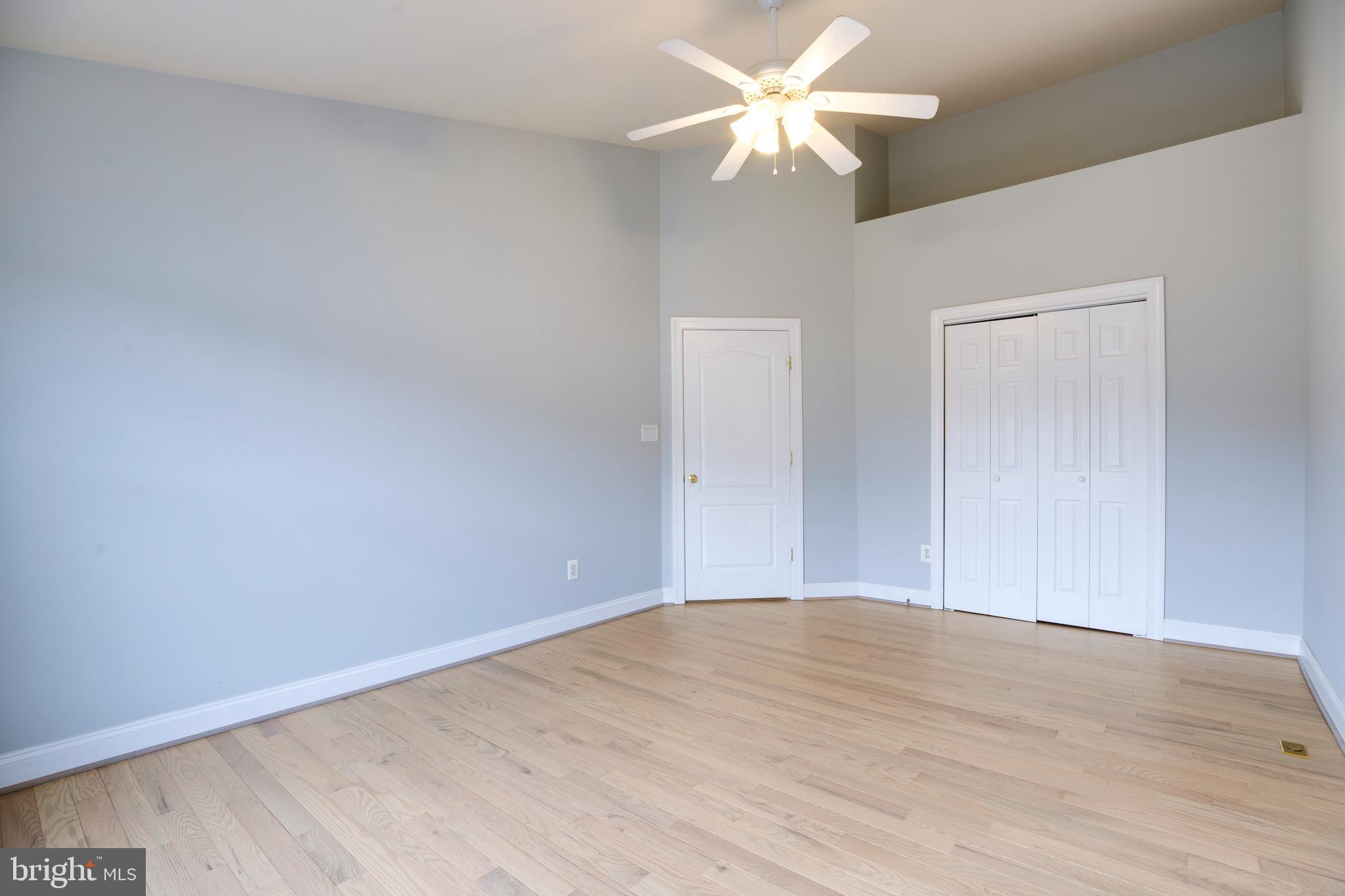 8069 Gatehouse Road, Unit 23 Falls Church, VA 22042 - Photo 29 of 43 wooden floor in an empty room