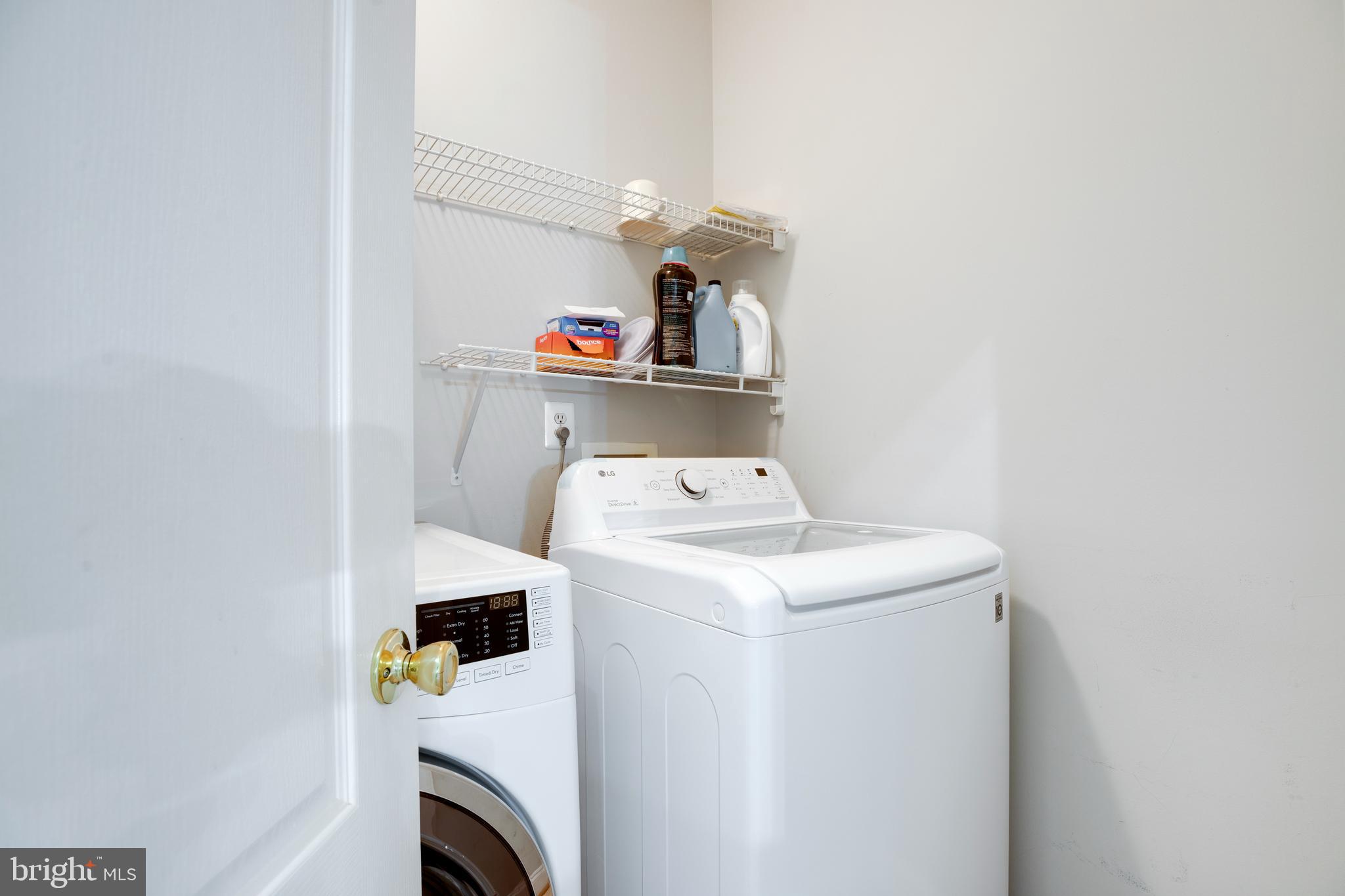 8069 Gatehouse Road, Unit 23 Falls Church, VA 22042 - Photo 38 of 43 a utility room with dryer and washer
