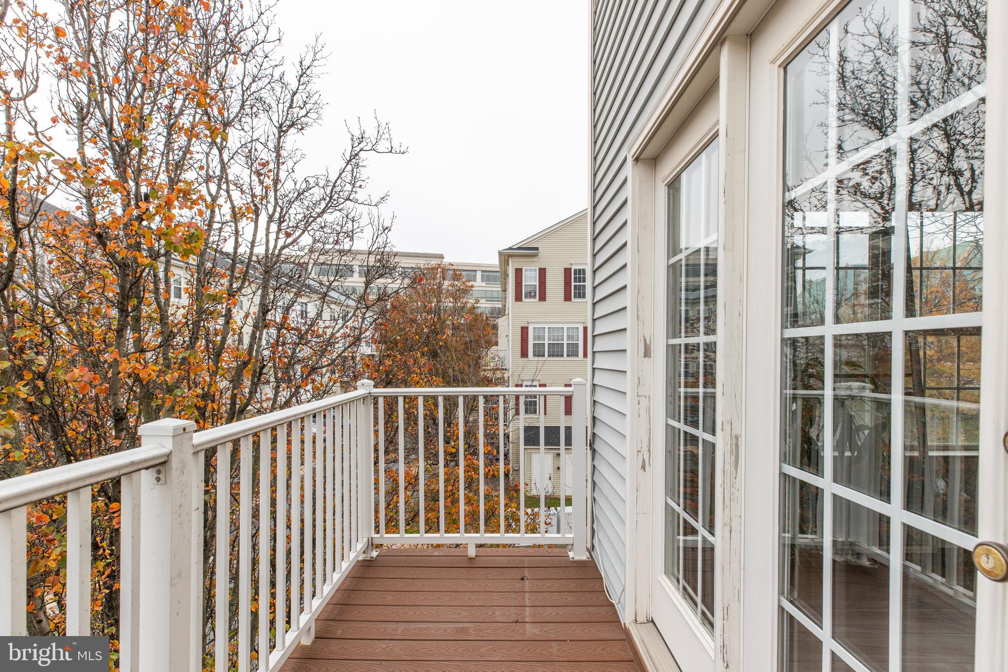 8069 Gatehouse Road, Unit 23 Falls Church, VA 22042 - Photo 40 of 43 a view of a balcony with a pot