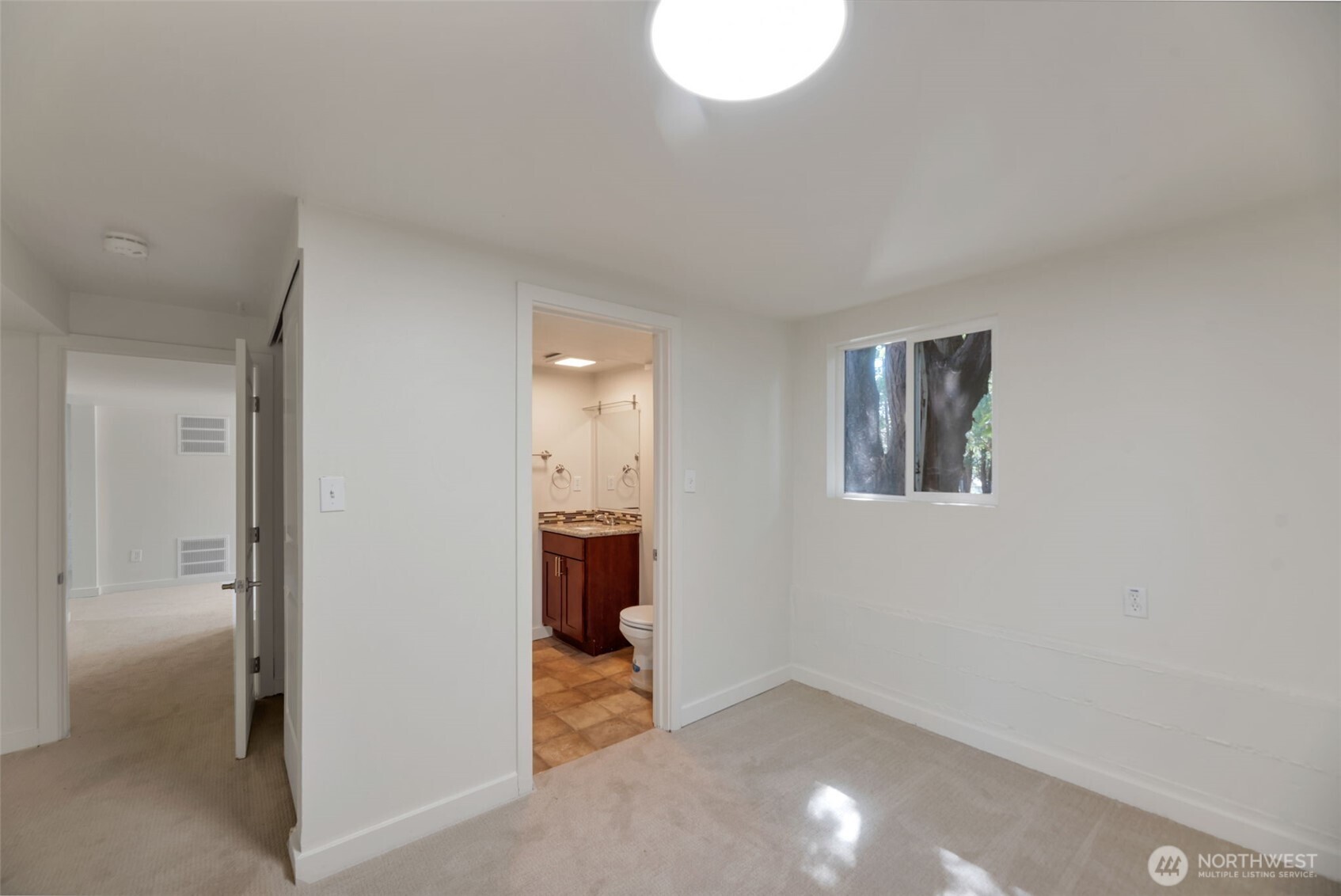 11229 29th Avenue Southwest Seattle, WA 98146 - Photo 20 of 28 a view of an empty room and window