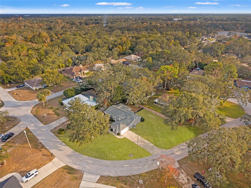 542 Fairbanks Road Spring Hill, FL 34608 - Photo 6 of 45 an aerial view of residential houses with outdoor space