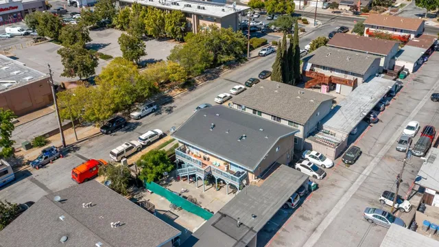 an aerial view of a house with a garden