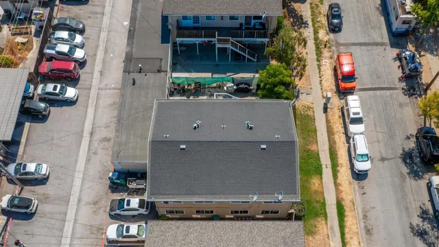 an aerial view of houses and roads