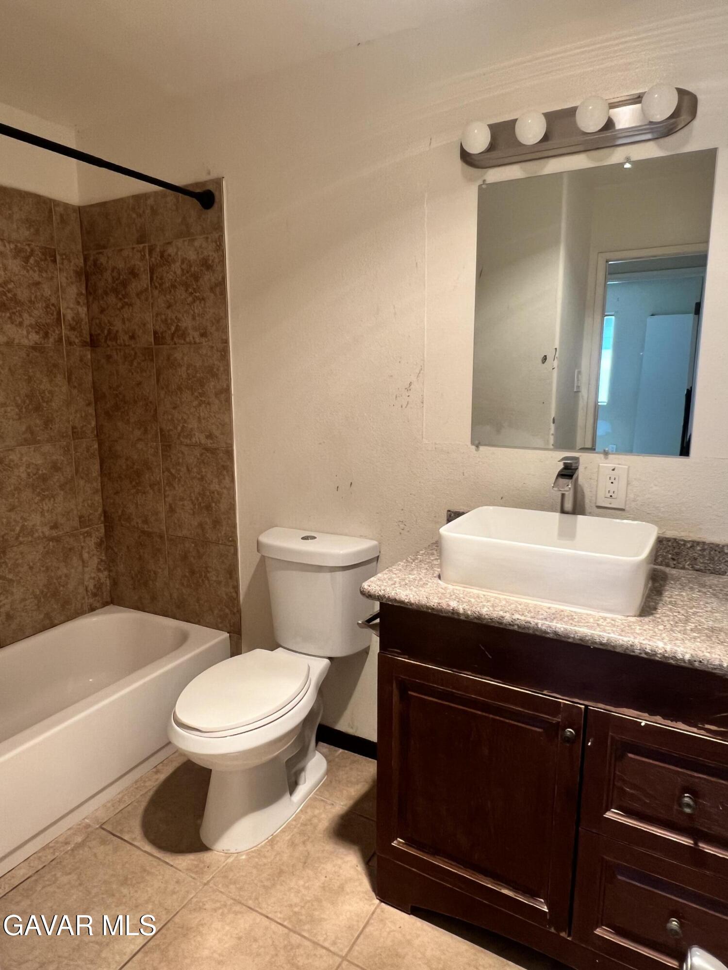 13632 Fran Street North Edwards, CA 93523 - Photo 13 of 18 a bathroom with a sink toilet and shower