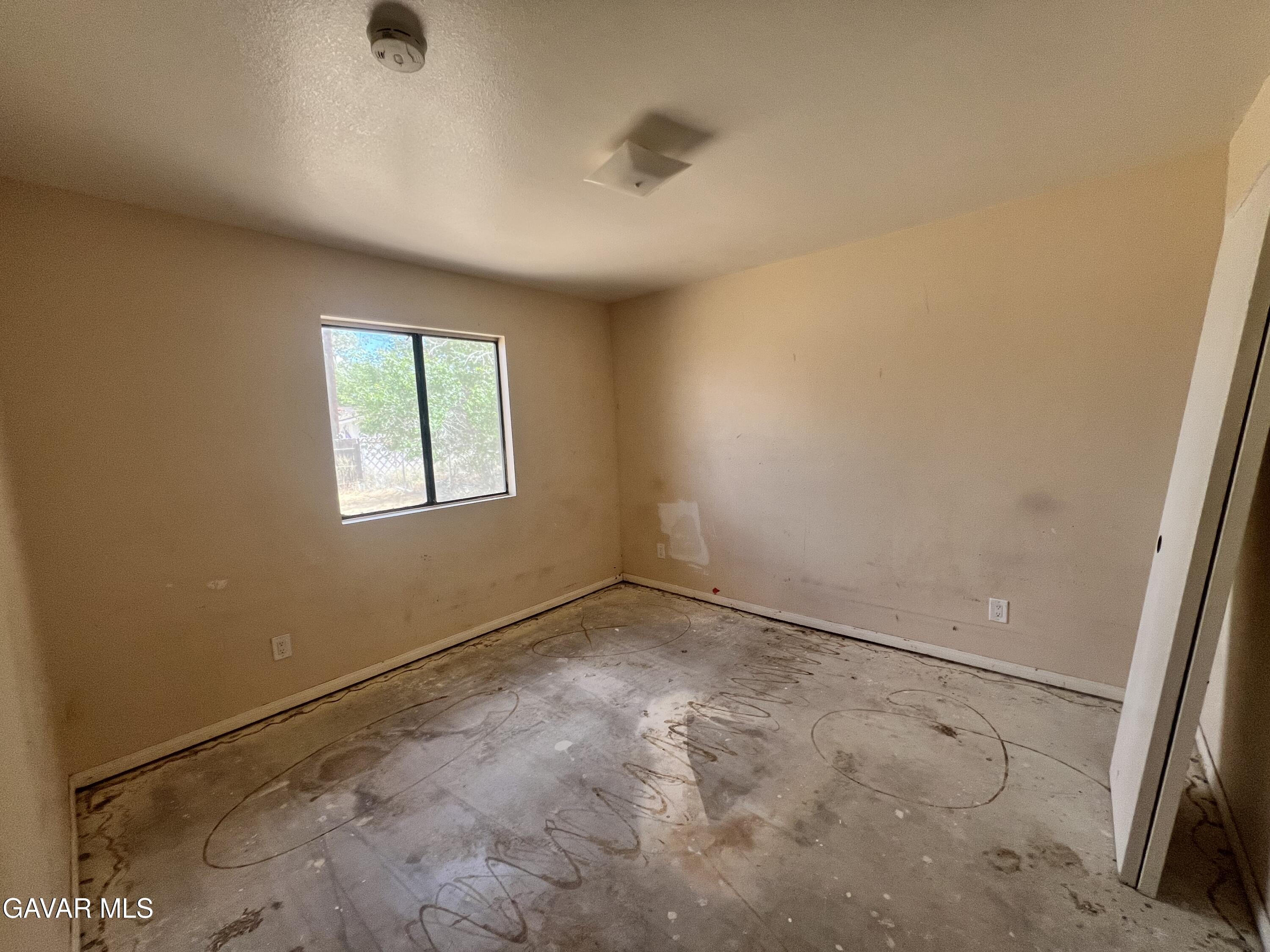 13632 Fran Street North Edwards, CA 93523 - Photo 14 of 18 an empty room with windows