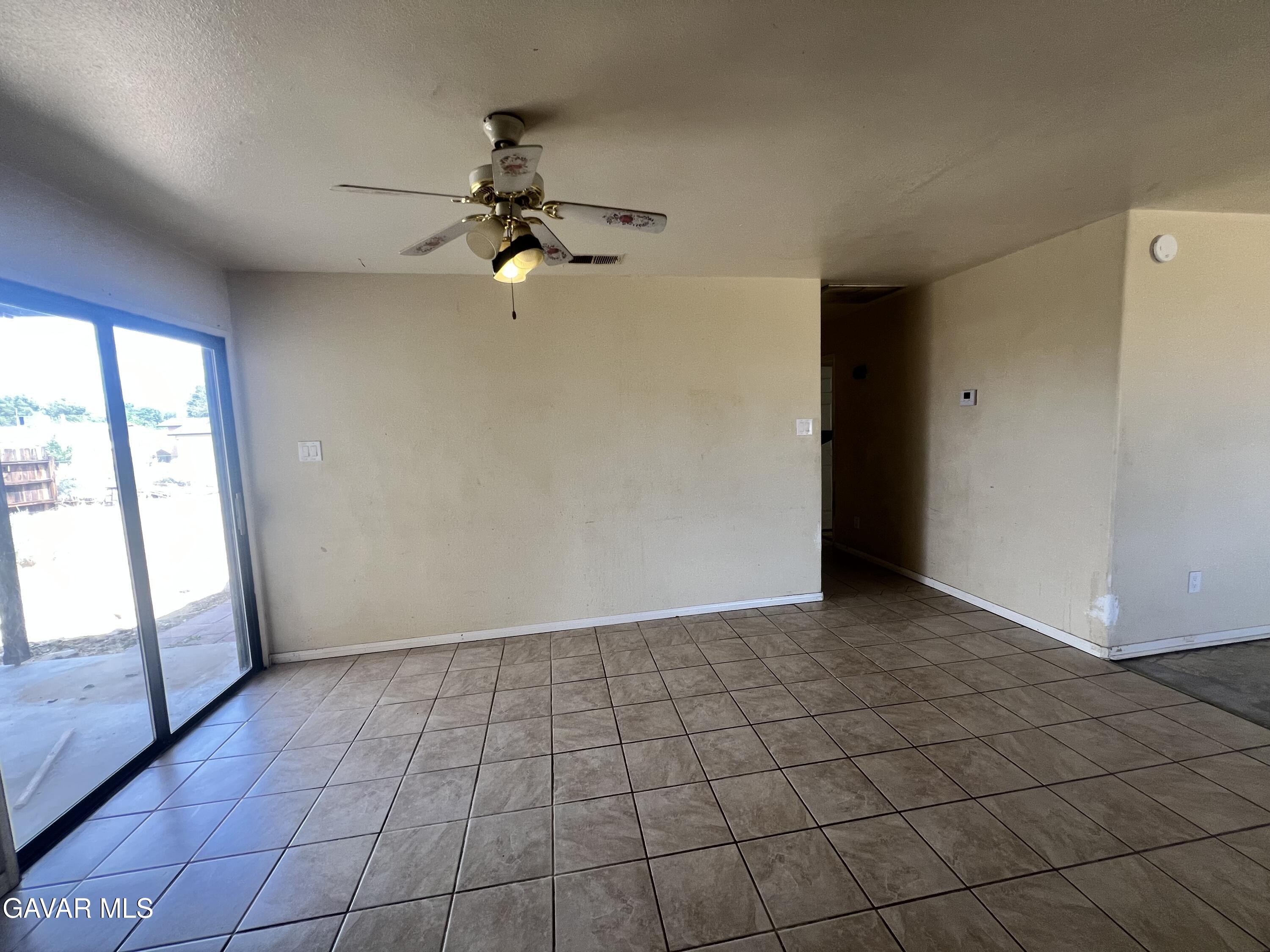 13632 Fran Street North Edwards, CA 93523 - Photo 7 of 18 a view of an empty room and window