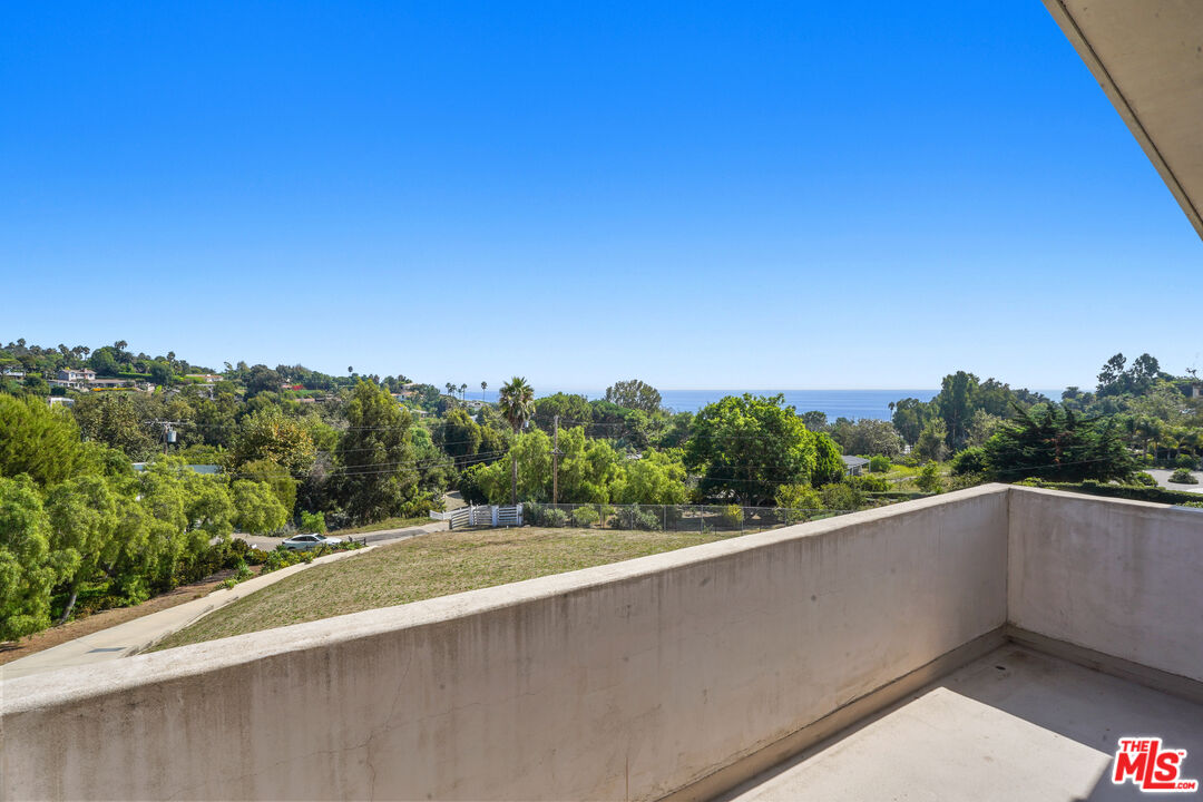 6405 Sycamore Meadows Drive Malibu, CA 90265 - Photo 13 of 26 a view of a balcony with an outdoor space