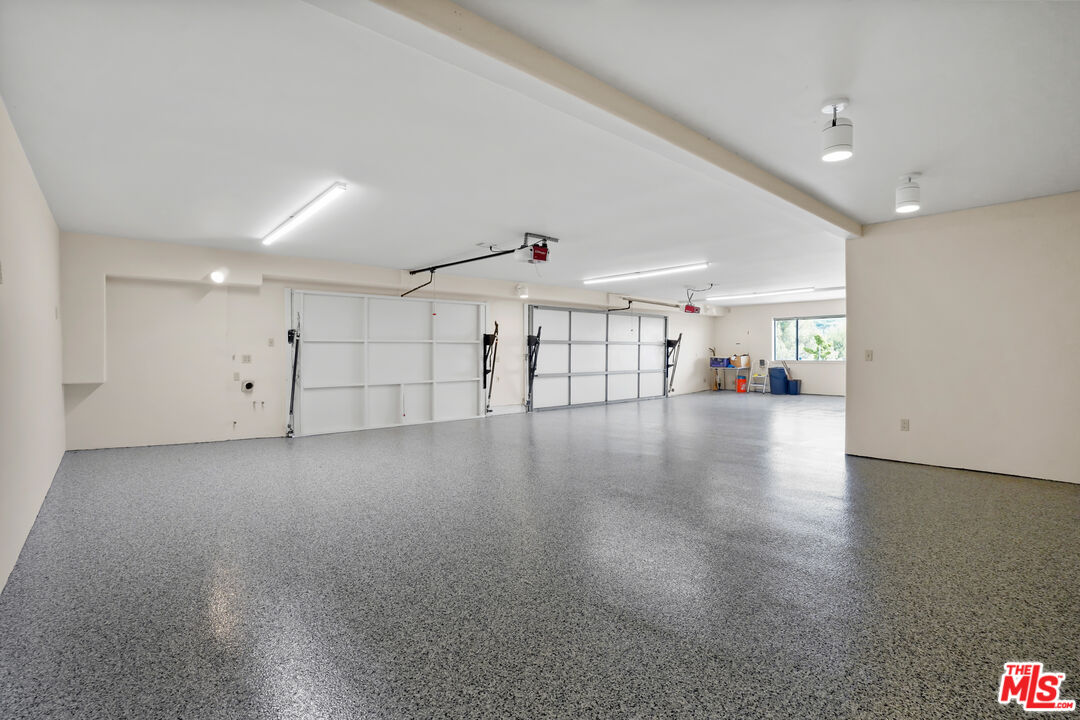 6405 Sycamore Meadows Drive Malibu, CA 90265 - Photo 19 of 26 a view of a livingroom with wooden floor