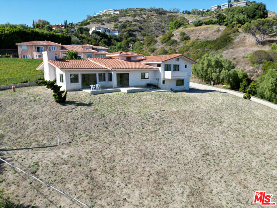 6405 Sycamore Meadows Drive Malibu, CA 90265 - Photo 3 of 26 an aerial view of residential houses with yard