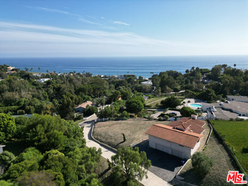 6405 Sycamore Meadows Drive Malibu, CA 90265 - Photo 4 of 26 an aerial view of a house with a yard